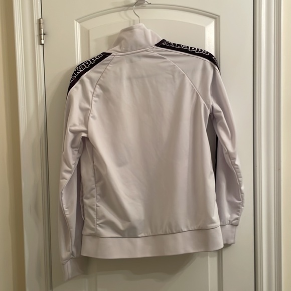 I am selling a small white zip up hoodie - Picture 2 of 3